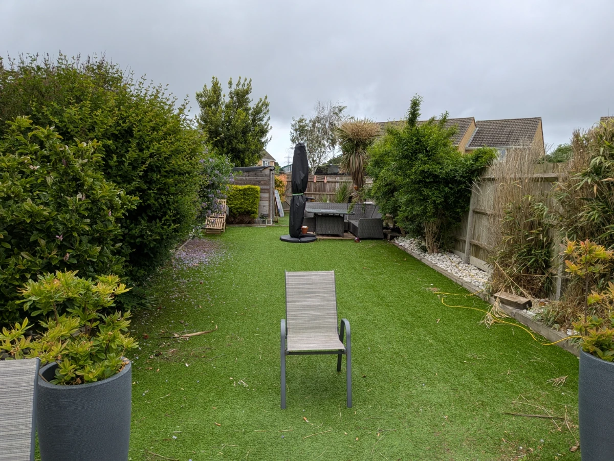 The triangular garden space at the western end